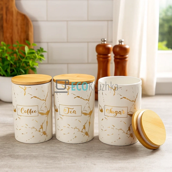 Набір керамічних банок з бамбуковими кришками та мармуро ... Набір керамічних банок з бамбуковими кришками та мармуро ...